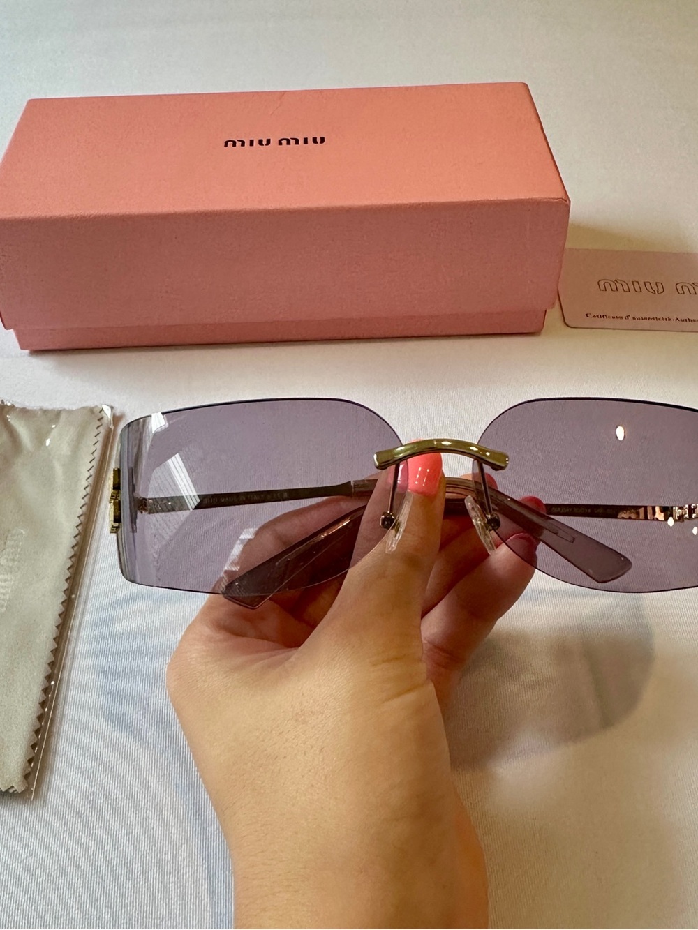 Miu Miu Gold-Accent MU 54Y Rimless Sunglasses with Purple Lenses